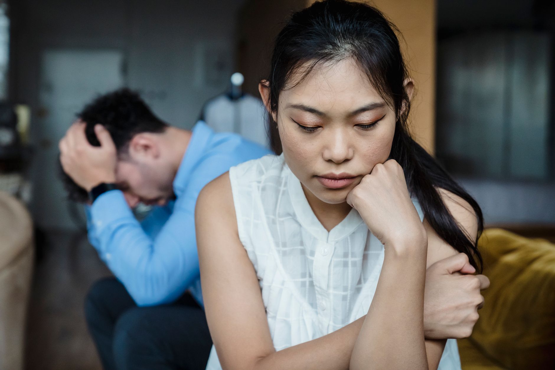Couple experiencing emotional withdrawal and silence at home